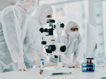 Cropped hand of scientist working in laboratory