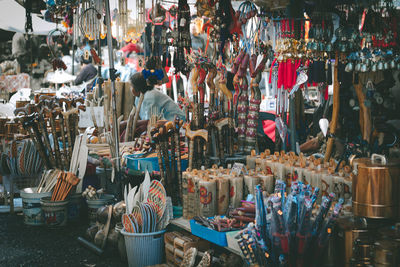 Woman at market stall