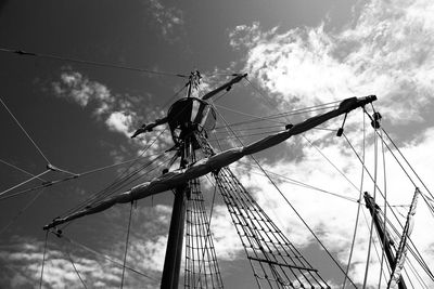 Low angle view of ship sailing against sky