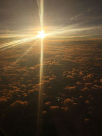 Scenic view of landscape against sky at sunset