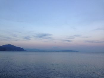 Scenic view of sea against sky at sunset