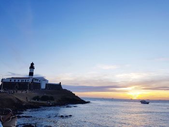 Scenic view of sea against sky at sunset