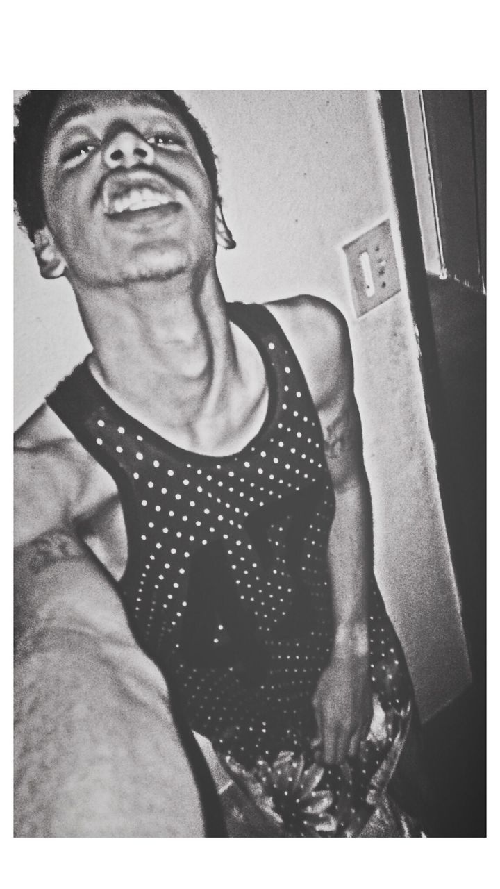 transfer print, auto post production filter, indoors, person, lifestyles, young men, young adult, front view, casual clothing, leisure activity, close-up, mid adult, mid adult men, looking at camera, home interior, portrait, communication, men