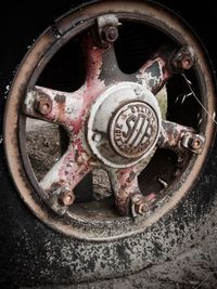 High angle view of clock on metal chain