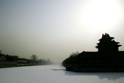 View of built structures against clear sky