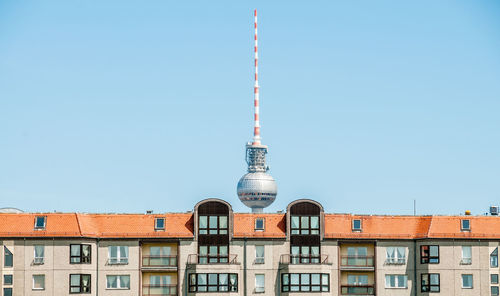 Low angle view of fernsehturm against clear sky