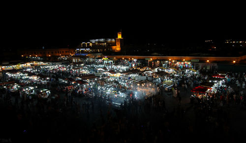 High angle view of illuminated city at night