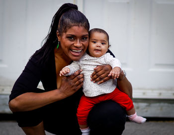 Portrait of smiling mother and son