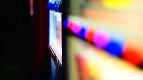 Defocused image of illuminated lights on wall