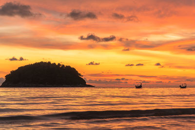 Scenic view of sea against sky during sunset