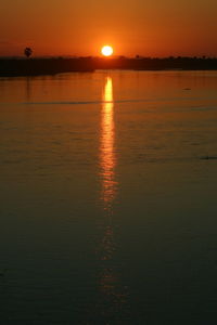 Scenic view of sunset over river