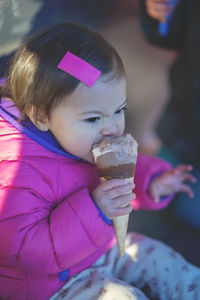 Close-up of woman holding ice cream