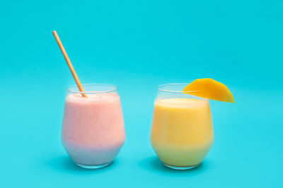 Close-up of drink against blue background