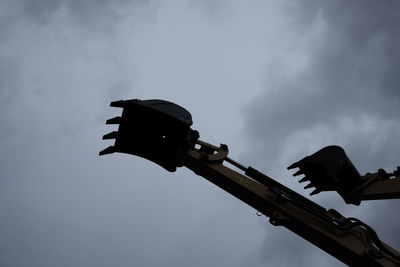 Low angle view of street light against sky