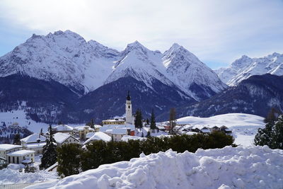 Scenic view of snowcapped mountains against sky