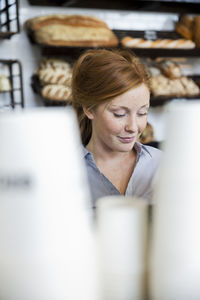 Woman in bakers shop, stockholm, sweden