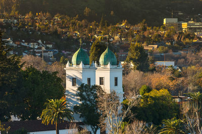 Panoramic view of trees and buildings in city