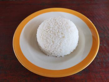 High angle view of cooked rice in plate on table