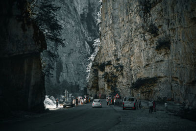 Panoramic view of people on mountain road