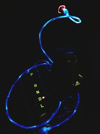 Illuminated ferris wheel at night