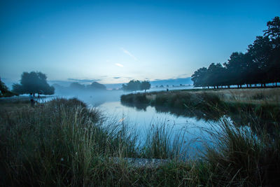 View of lake at sunset