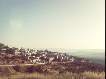 View of built structures against clear sky