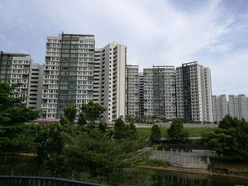 Low angle view of skyscrapers against sky