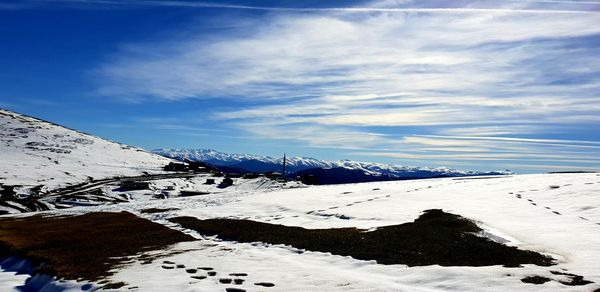 Snow covered mountain against sky