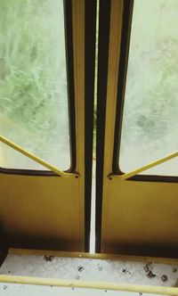 Close-up of yellow train window