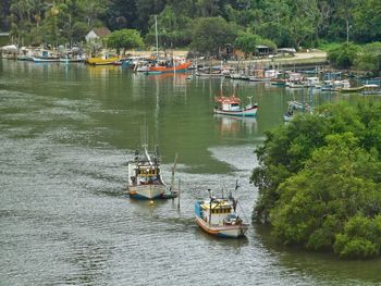 Boats sailing in river