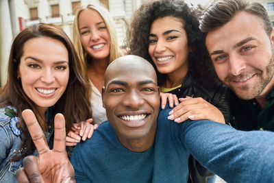 Close-up portrait of happy friends