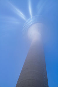 Low angle view of building against blue sky