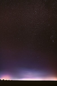 Low angle view of star field against sky at night