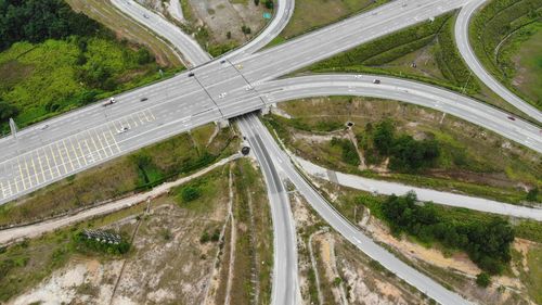 High angle view of highway by street in city