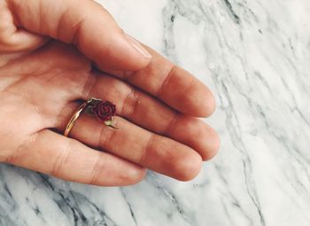 Close-up of hand holding ice cream