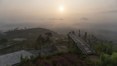 High angle view of landscape against sky during sunset