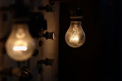 Close-up of illuminated light bulb