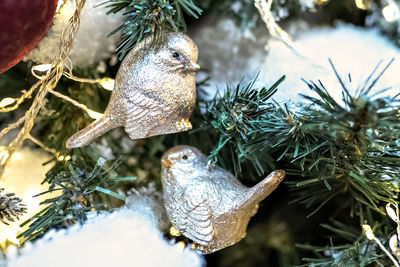 Christmas background of a christmas tree decorated with christmas toys.winter holidays. new year