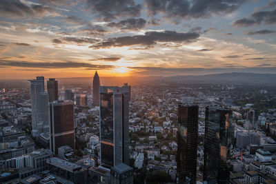 Cityscape against sky during sunset