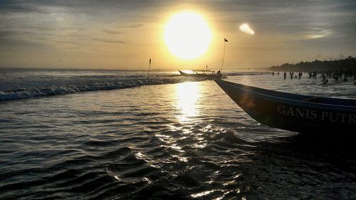 Scenic view of sea at sunset