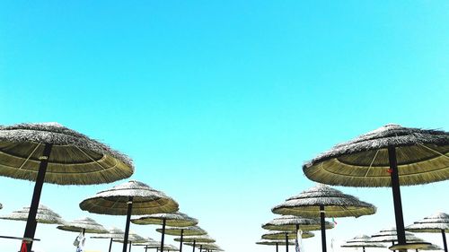 Low angle view of buildings against blue sky
