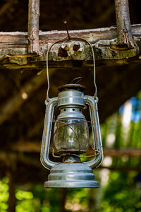 Close-up of old lantern hanging on ceiling