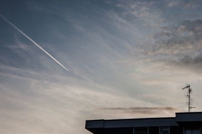 Low angle view of vapor trail against sky