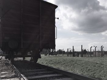 Train on field against sky