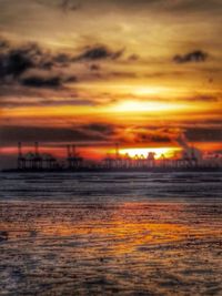 Scenic view of cloudy sky at sunset