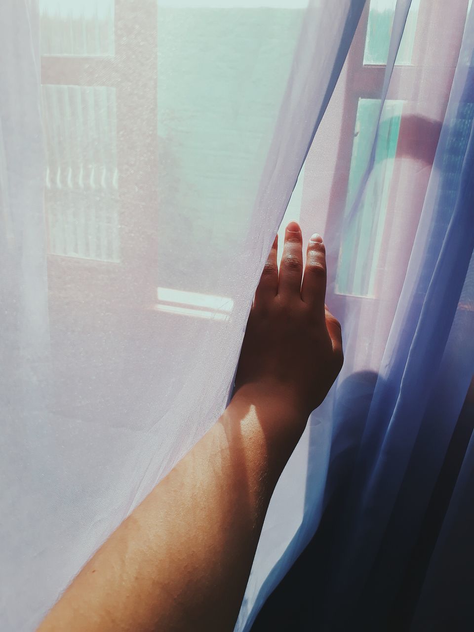 real people, window, human body part, one person, body part, human hand, indoors, hand, day, mode of transportation, glass - material, curtain, transportation, lifestyles, transparent, sunlight, personal perspective, vehicle interior, finger, human limb