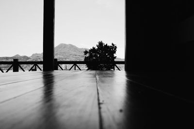 Shadow on table against clear sky