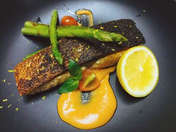 High angle view of oranges in plate