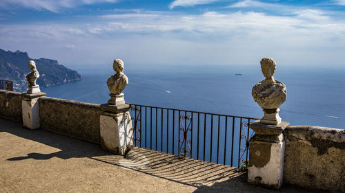 Statue against sea and sky