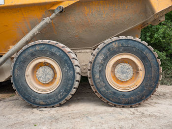 Wheel loader excavator for unloading crushed stones in open sand quarry or mine